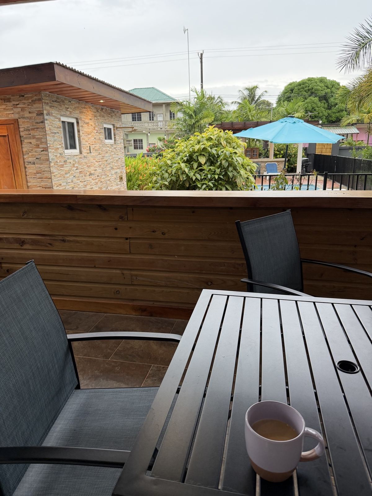 Morning coffee on the balcony overlooking the Paradise Palms grounds